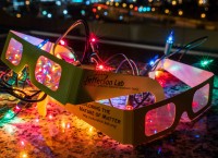 JLab's diffraction grating glasses with holiday light spectra visible
